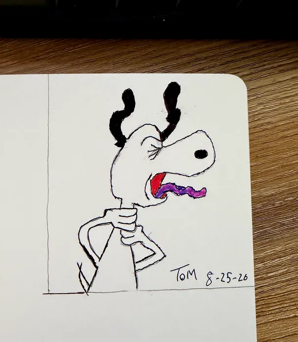 Snoopy with dark antlers and an open mouth.